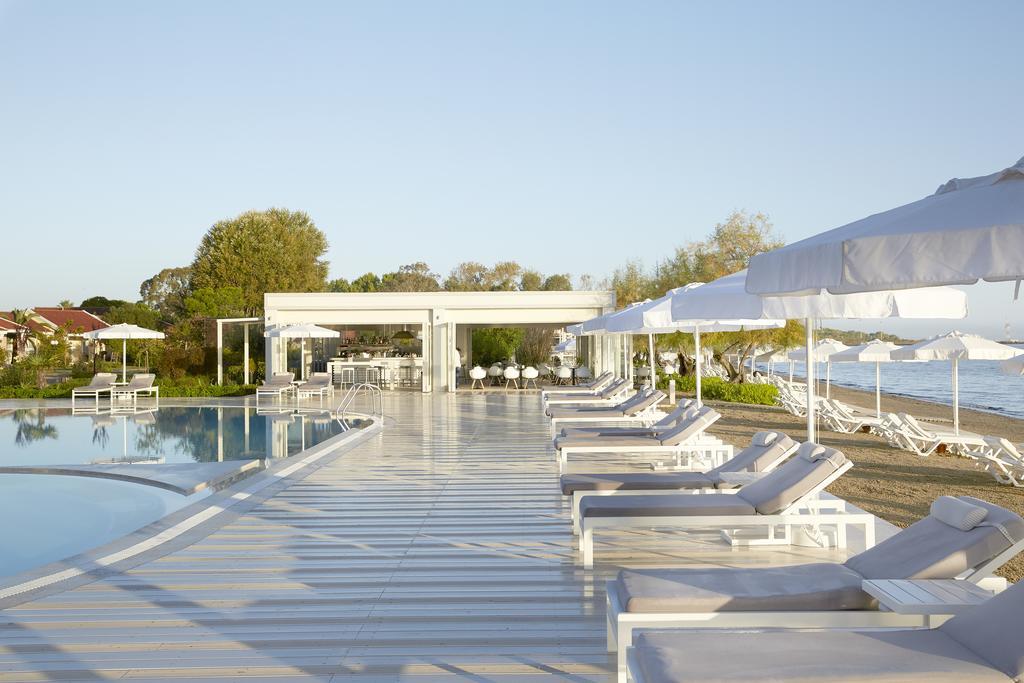Aparthotel Capo Di Corfu Kávos Exterior foto Beach at Porto Cervo